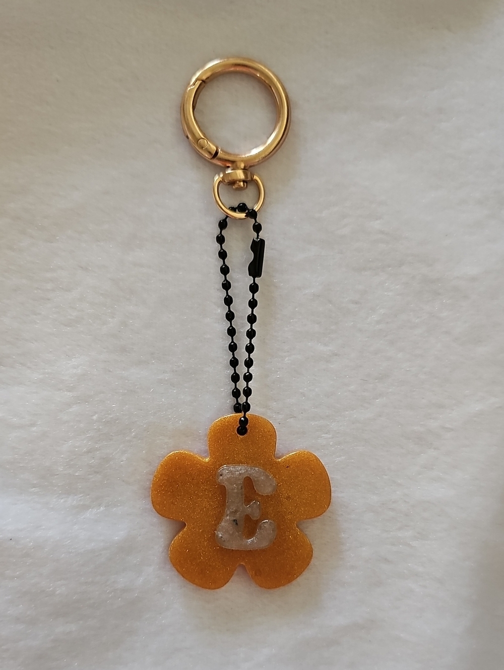 Gold Glitter Flower Initial 'E' Keychain